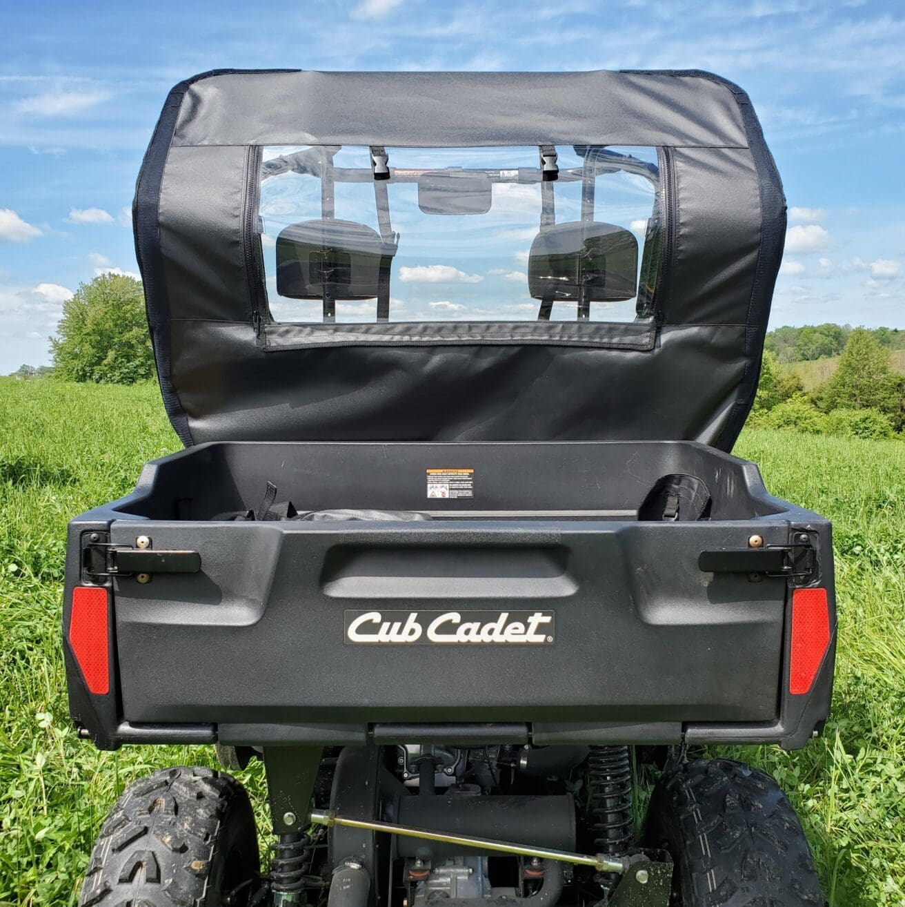 A rear view of the back end of an atv.