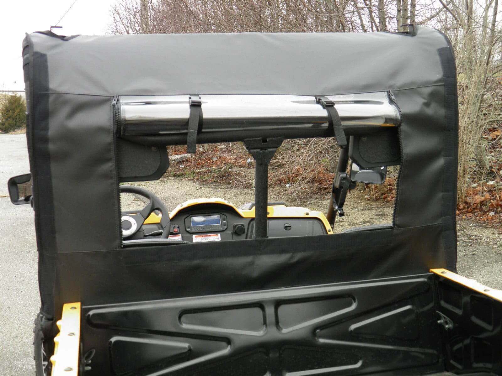 A view of the back window from behind the seat.