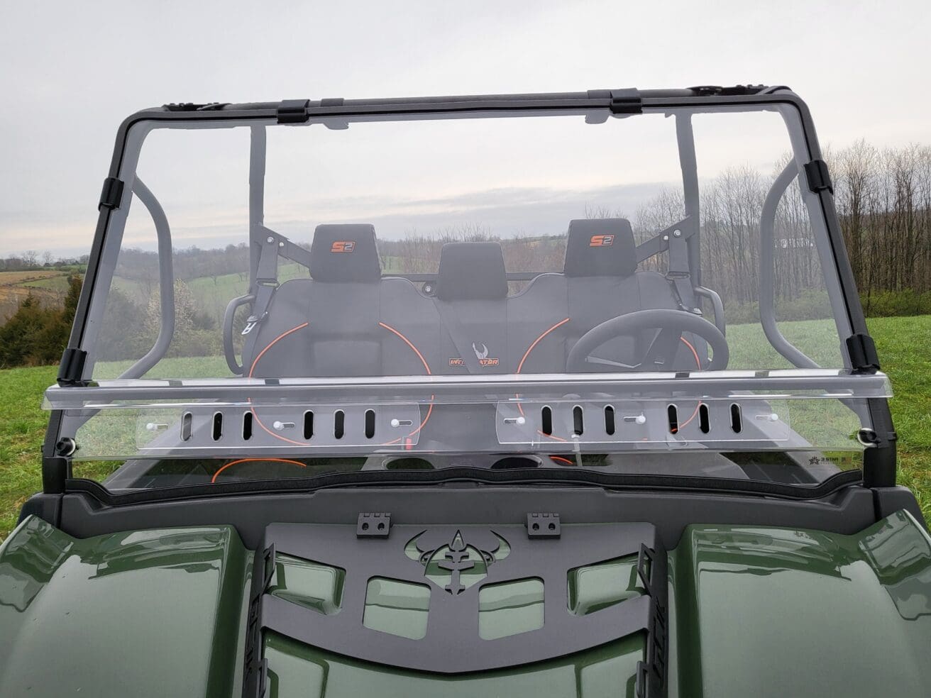 A close up of the back windshield on an atv.