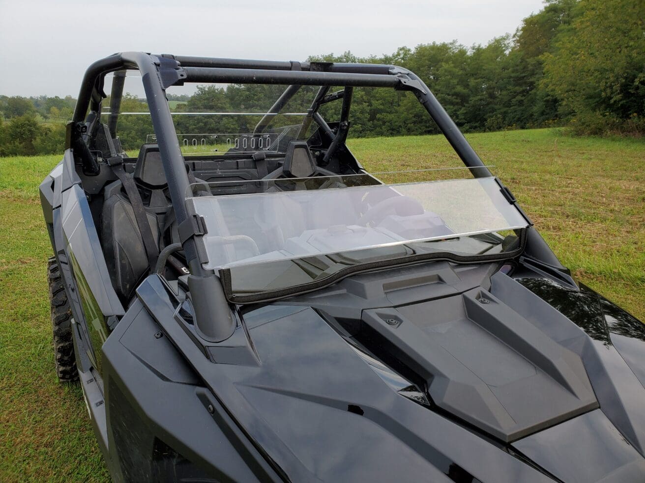 A picture of the back windshield on a vehicle.