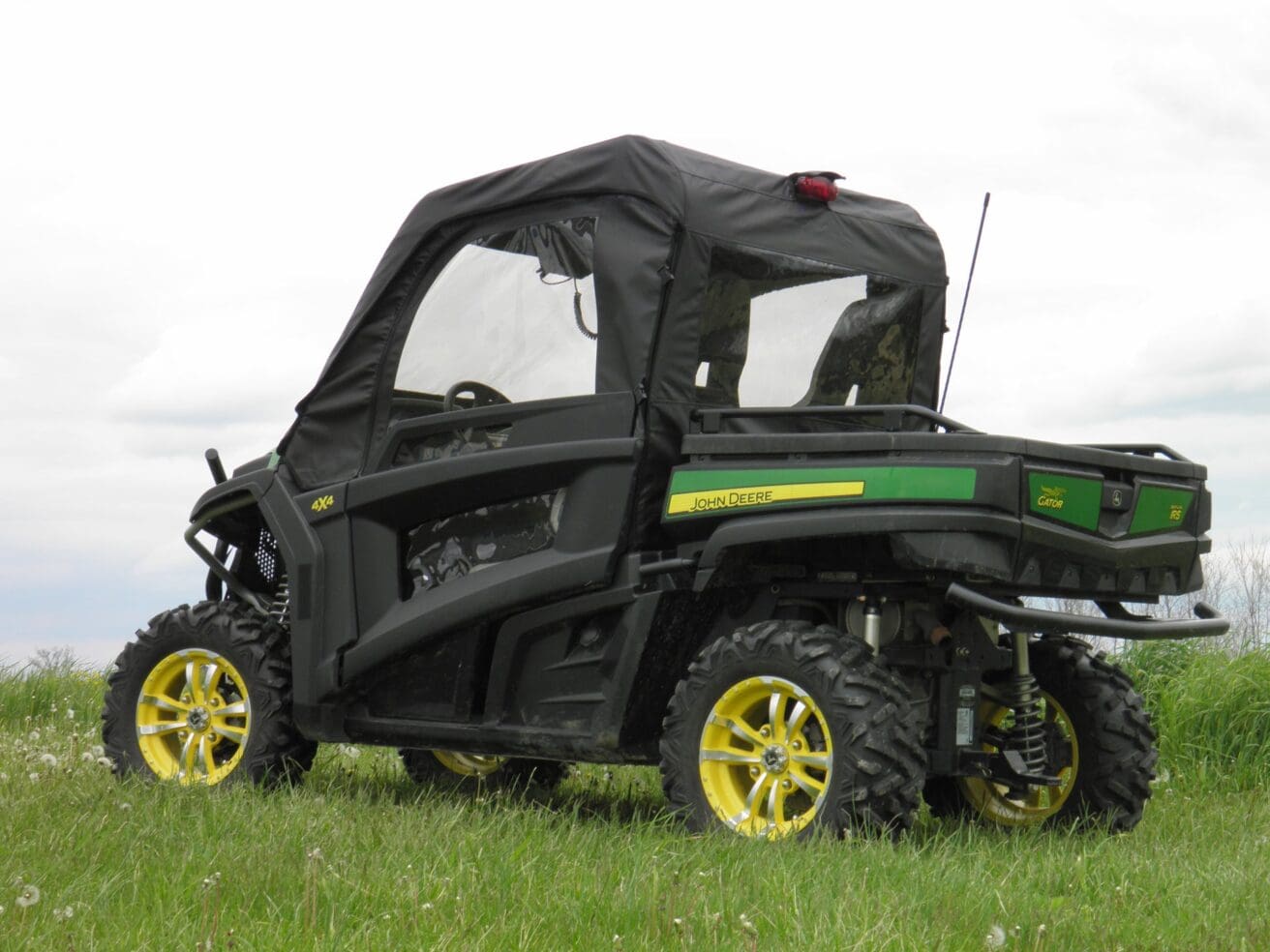 All-terrain vehicle on grassy field.