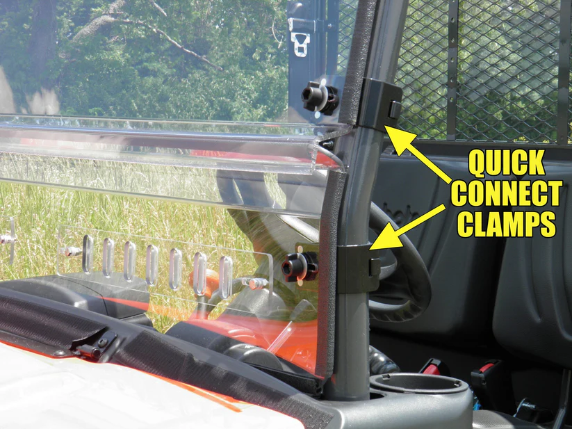 Quick connect clamps on vehicle windshield.