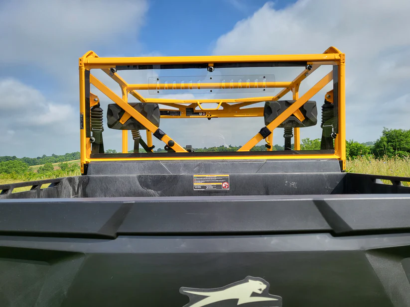Off-road vehicle with protective roll cage.