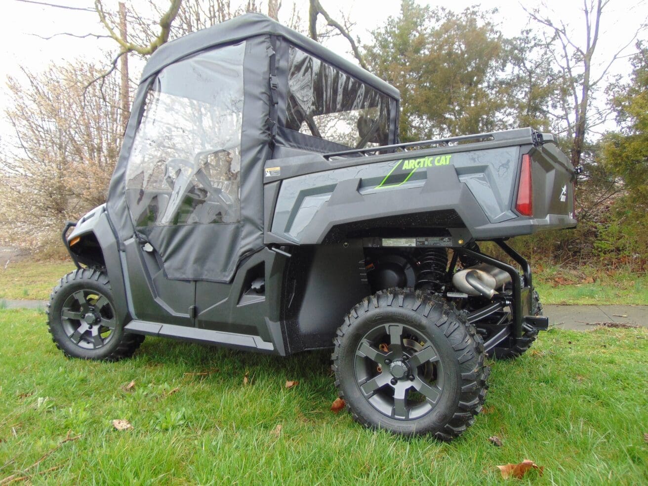 Side view of a black off-road vehicle.