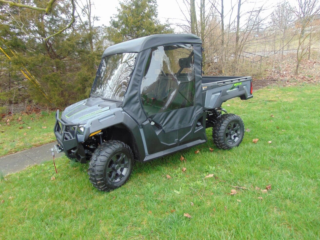 Off-road utility vehicle on grass.