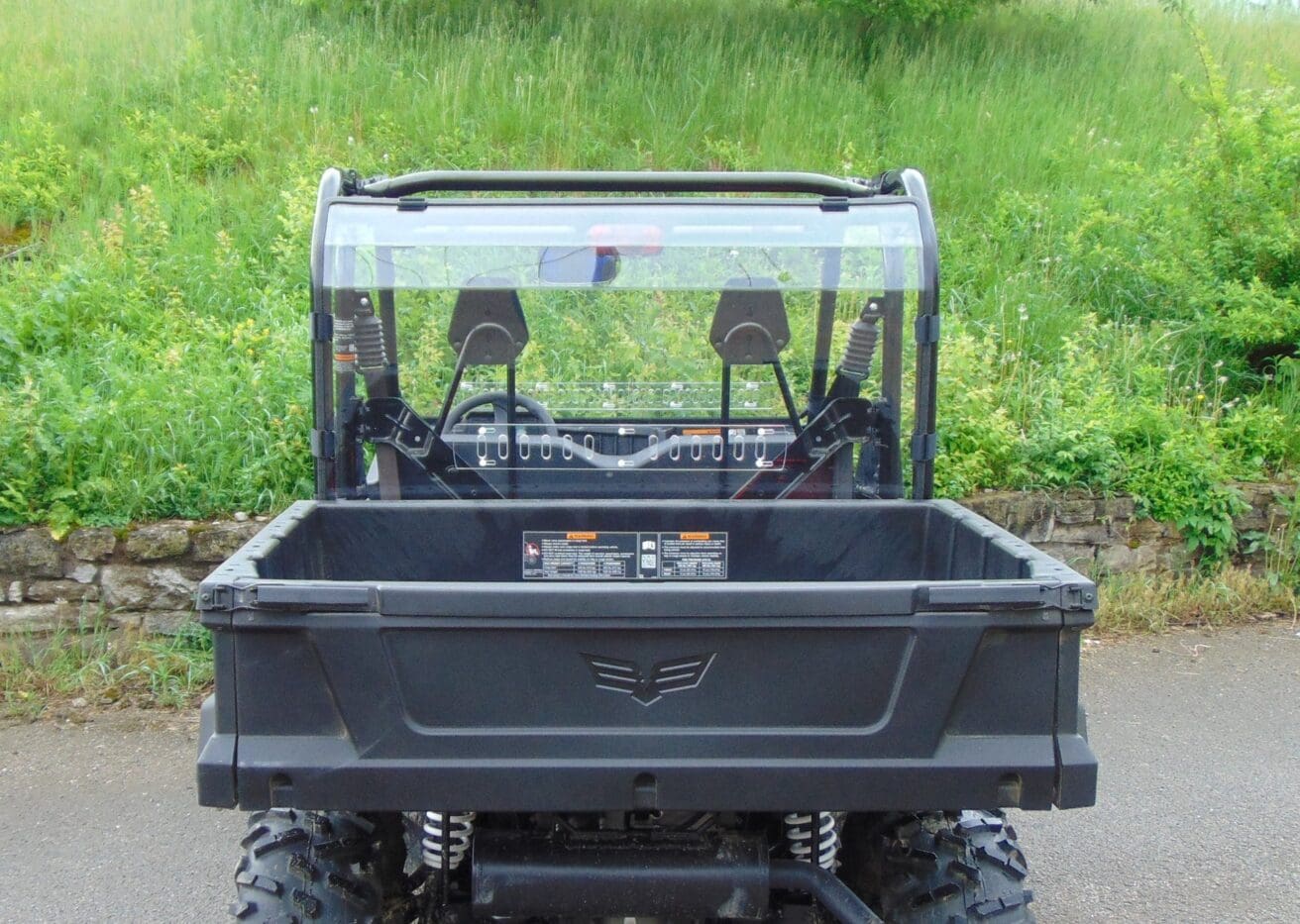 Off-road utility vehicle with cargo bed.