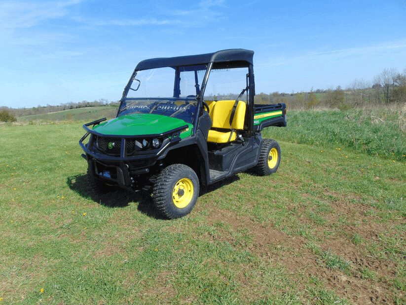 Green John Deere Gator utility vehicle.