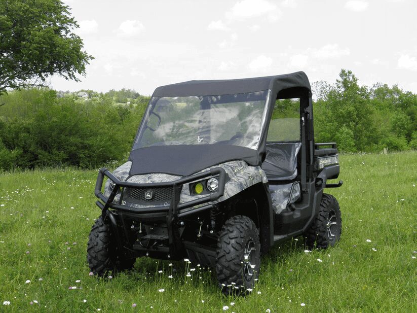 Utility vehicle parked on grassy field.