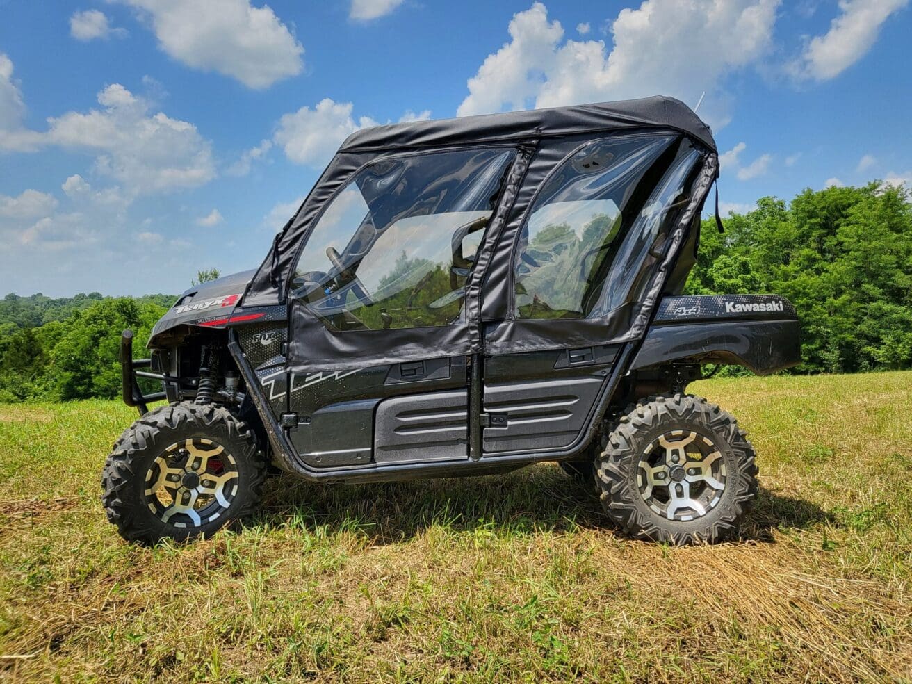 Black Kawasaki Mule with enclosed cab.