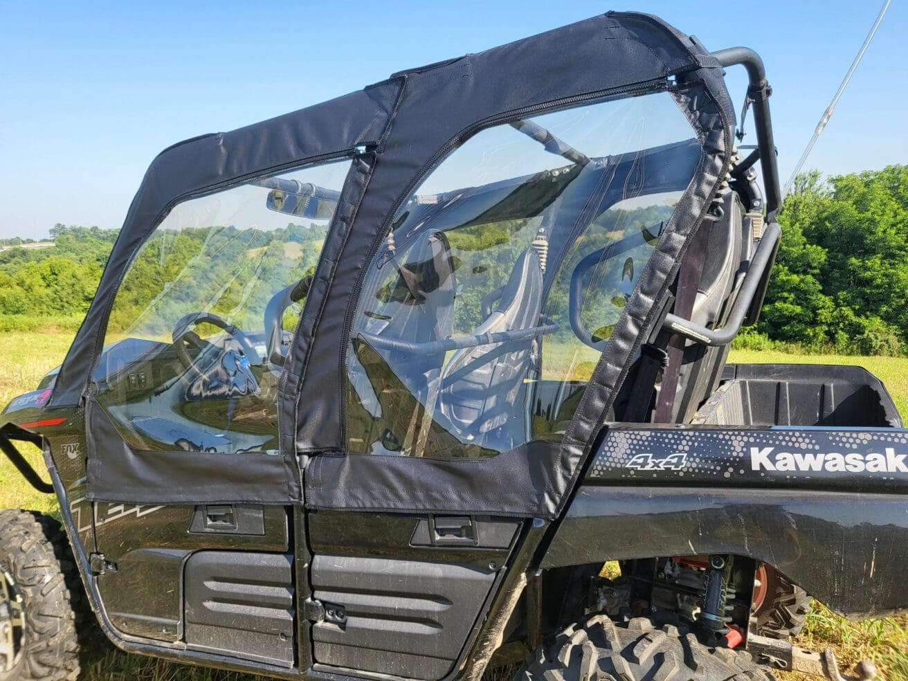 Black Kawasaki Mule soft doors with windows.