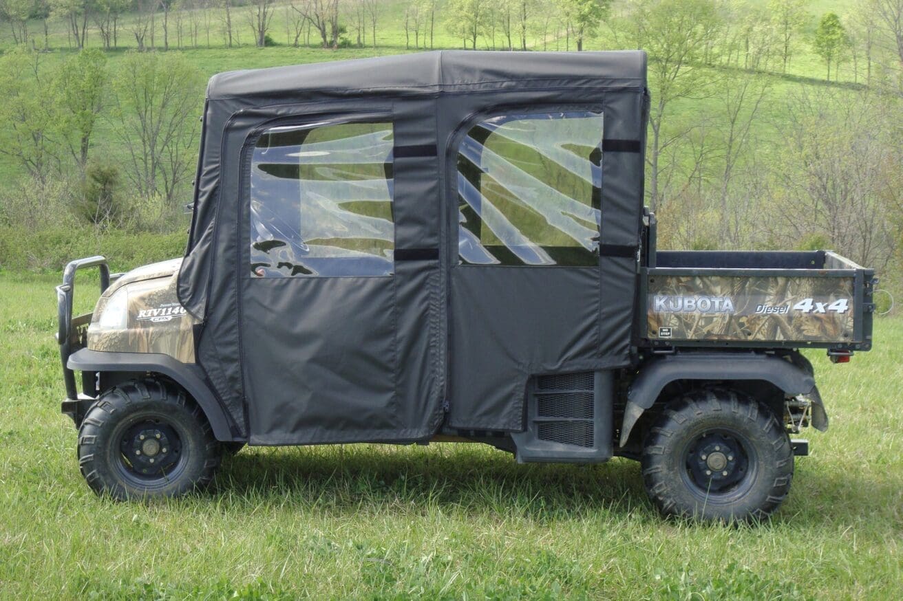 Kubota RTV1140 utility vehicle with cab enclosure.