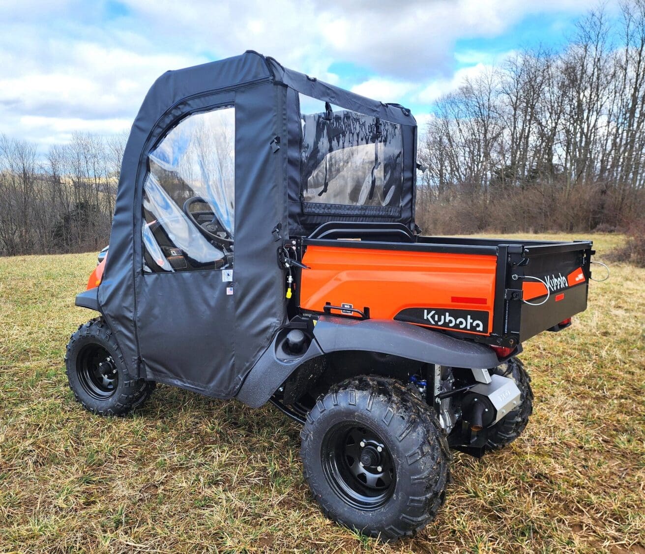 Kubota RTV with cab enclosure.