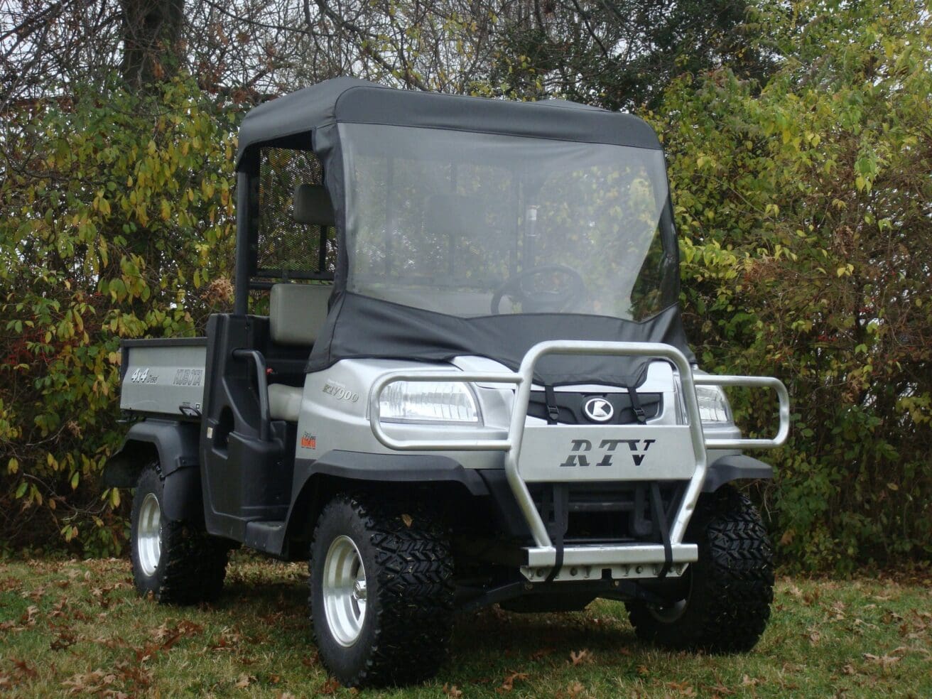 Silver RTV utility vehicle outdoors.