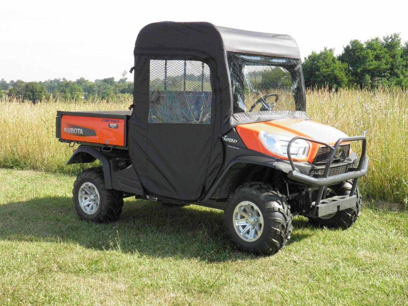 Kubota RTV 1200 with cab enclosure.