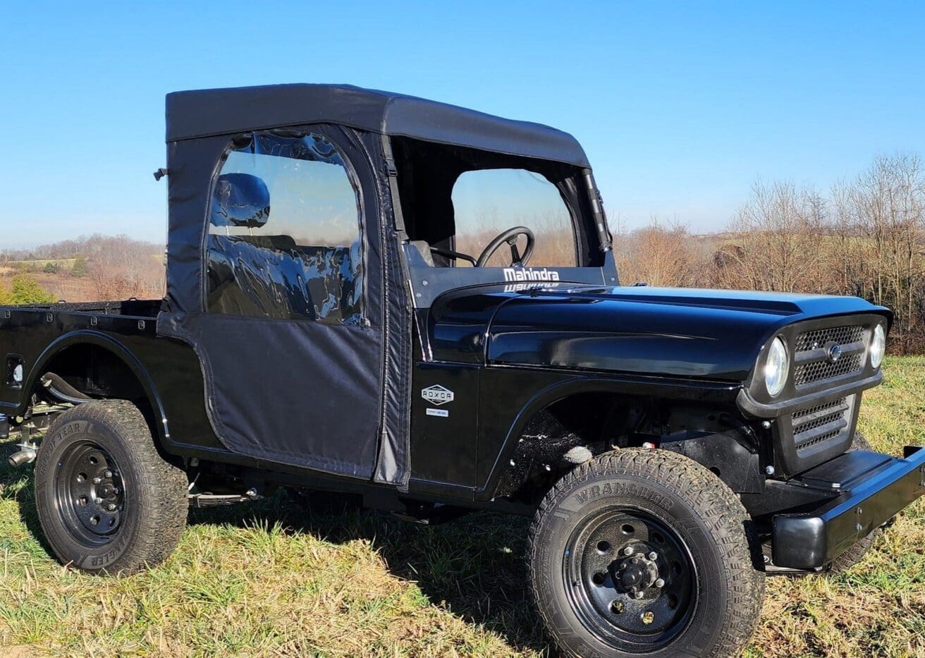 Black Mahindra Roxor utility vehicle.