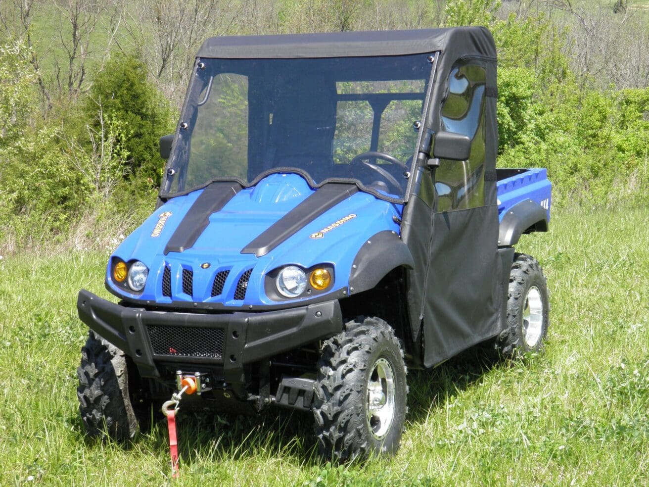 Blue utility vehicle with black doors.