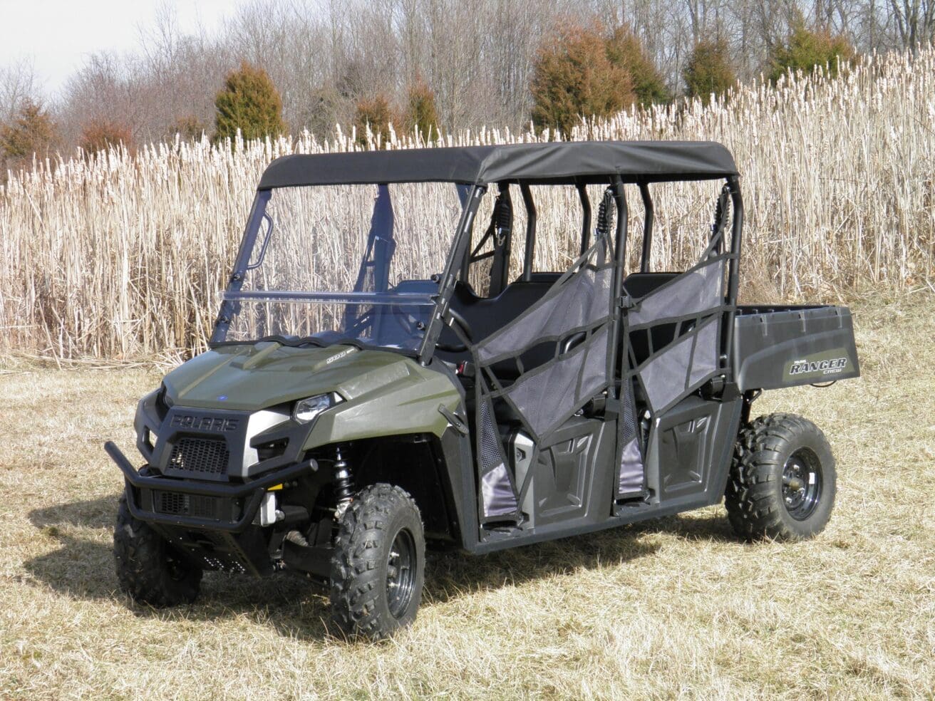Green Polaris Ranger Crew utility vehicle.