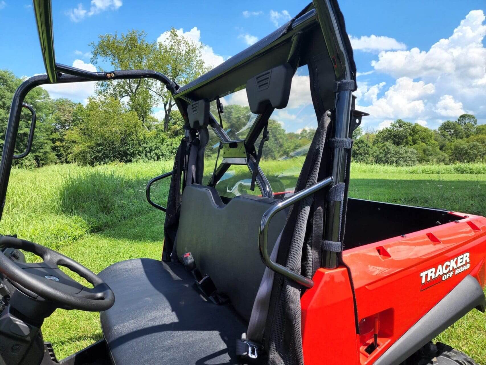 Red Tracker Off-Road vehicle back seat.