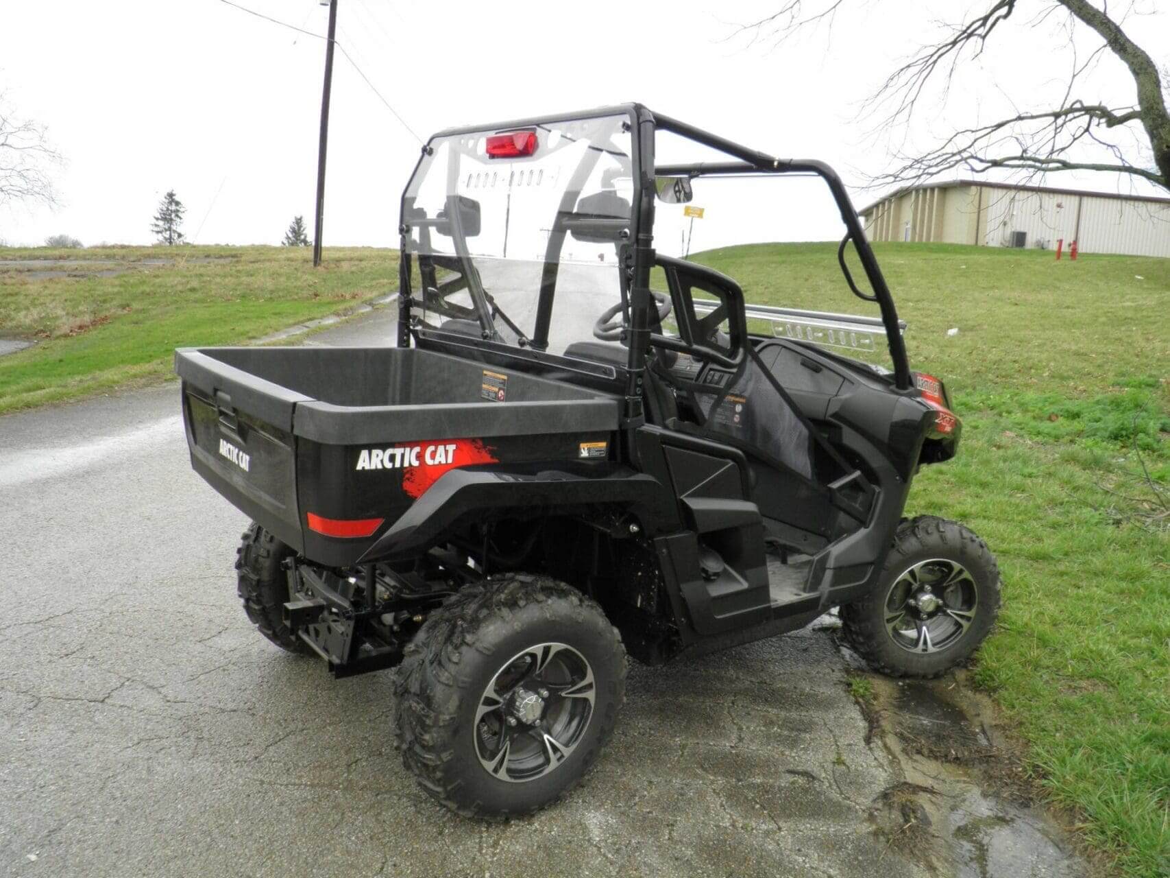 Black Arctic Cat utility vehicle.