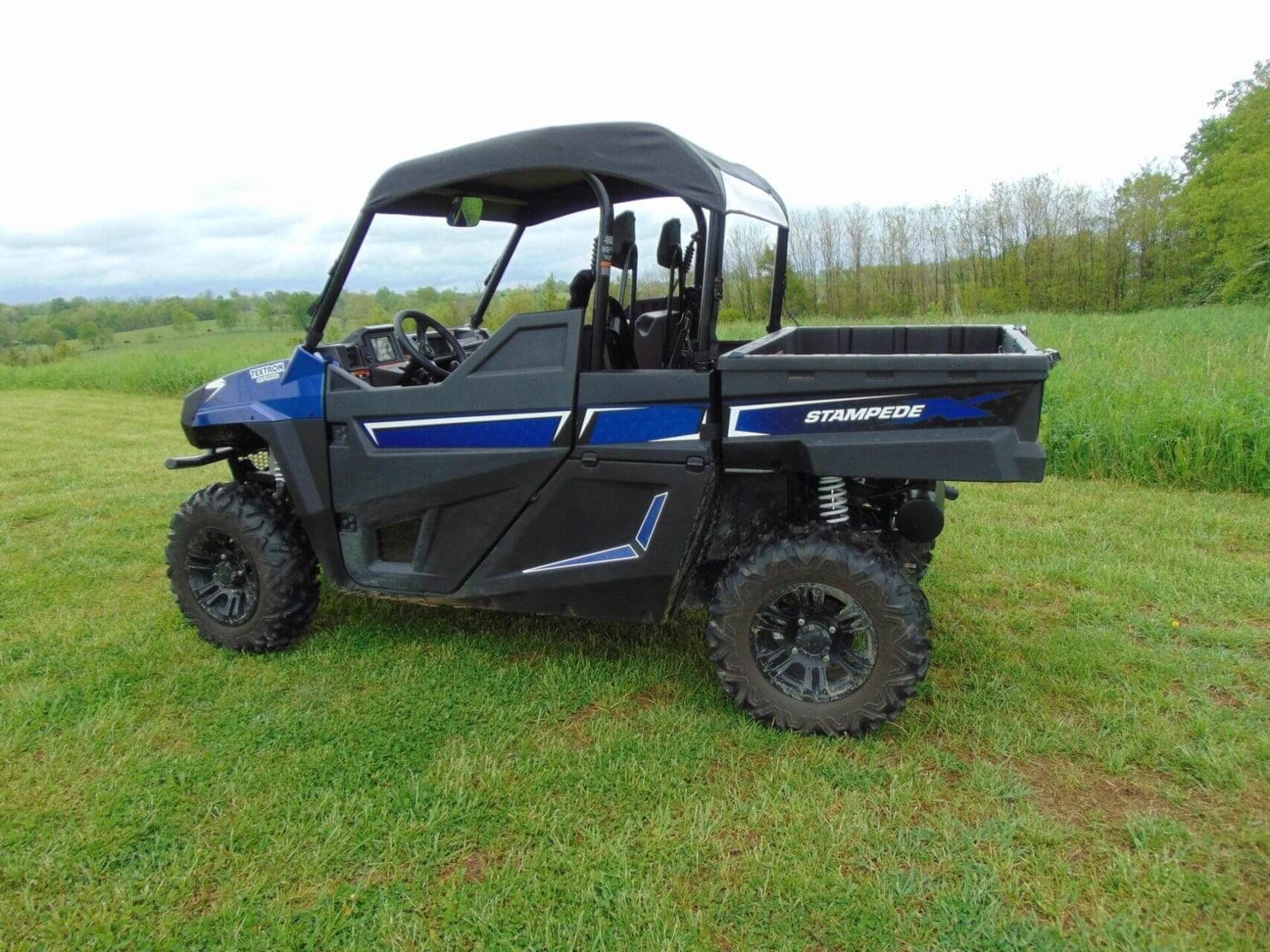 Blue Stampede utility terrain vehicle.