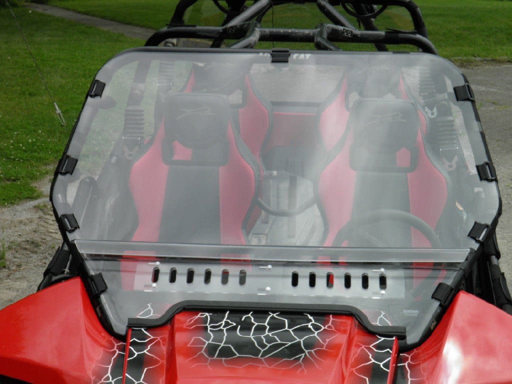 Clear windshield for red off-road vehicle.