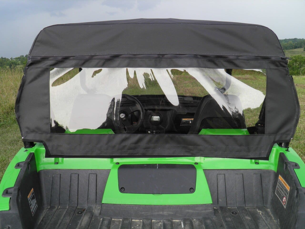 Here's an alt tag for the image: Black rear window for ATV.