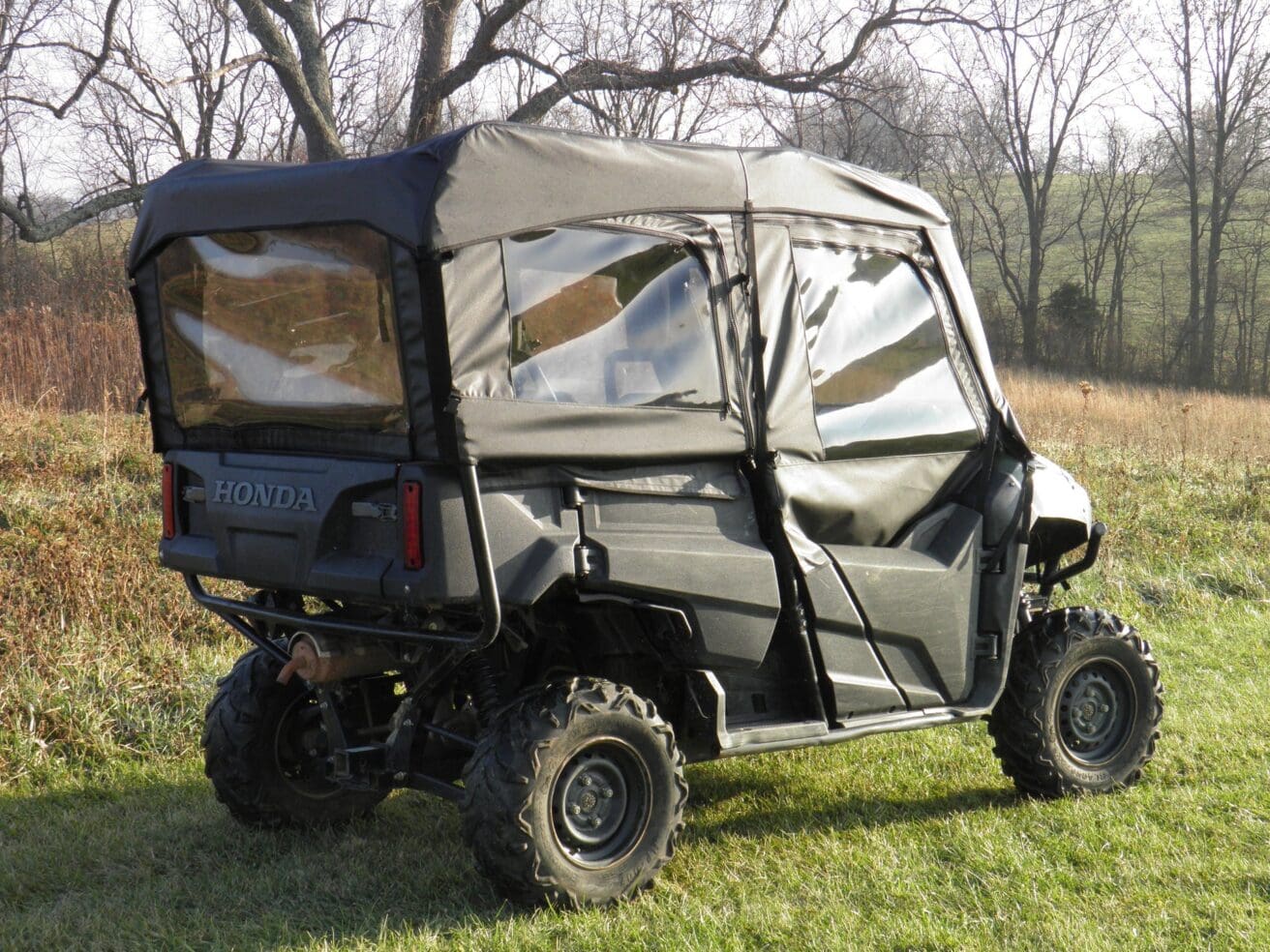 Honda Pioneer side-by-side with cab enclosure.