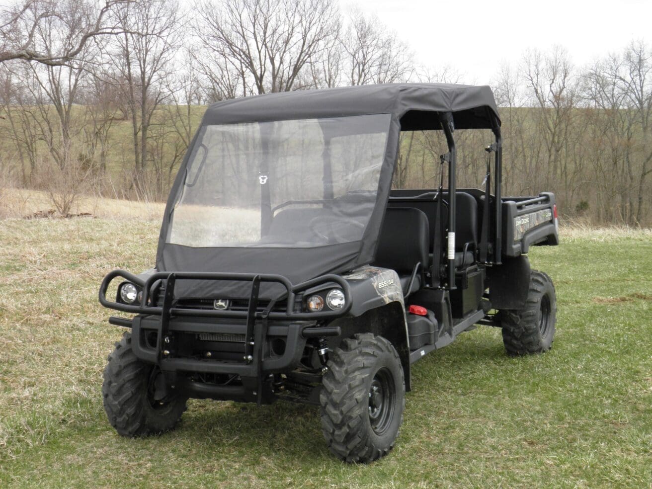 Black John Deere Gator utility vehicle.
