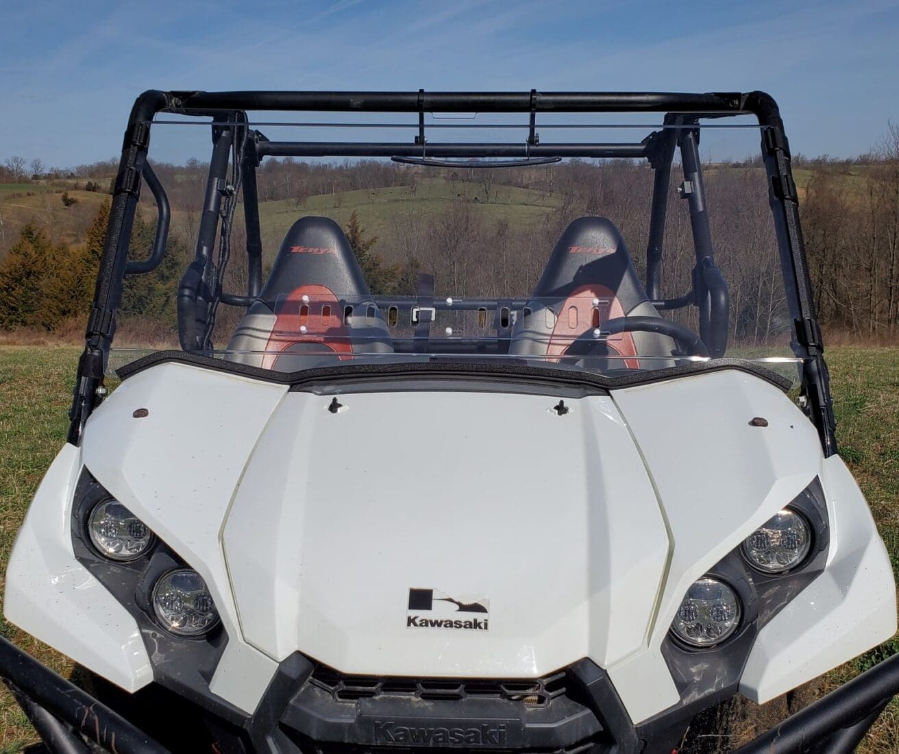 White Kawasaki Mule with windshield.