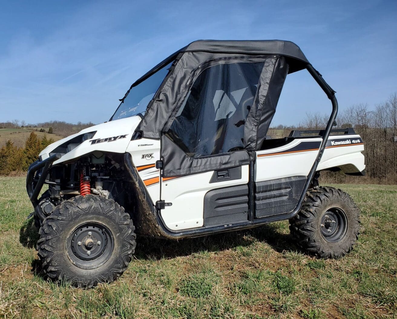 White Kawasaki Teryx 4x4 side-by-side.