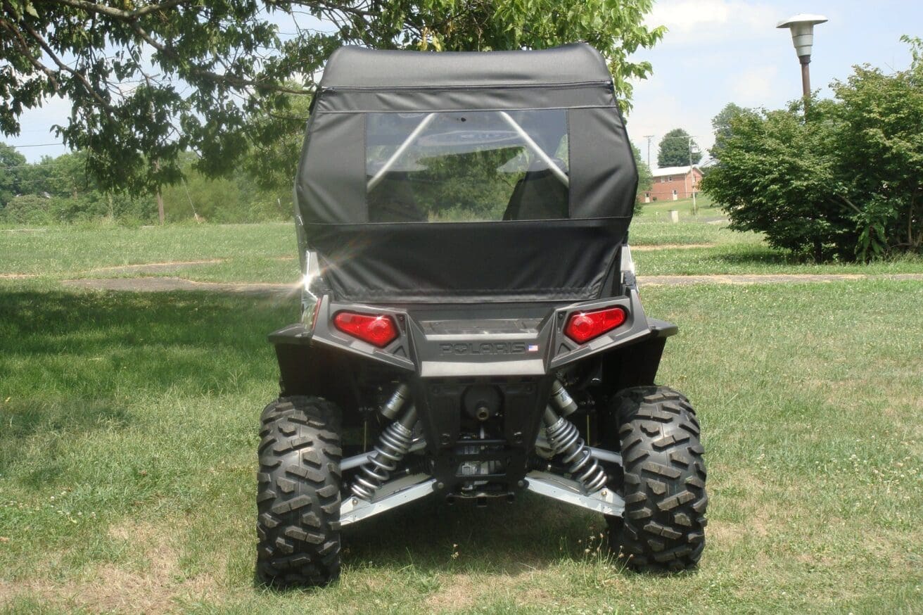 Rear view of Polaris RZR with canopy.