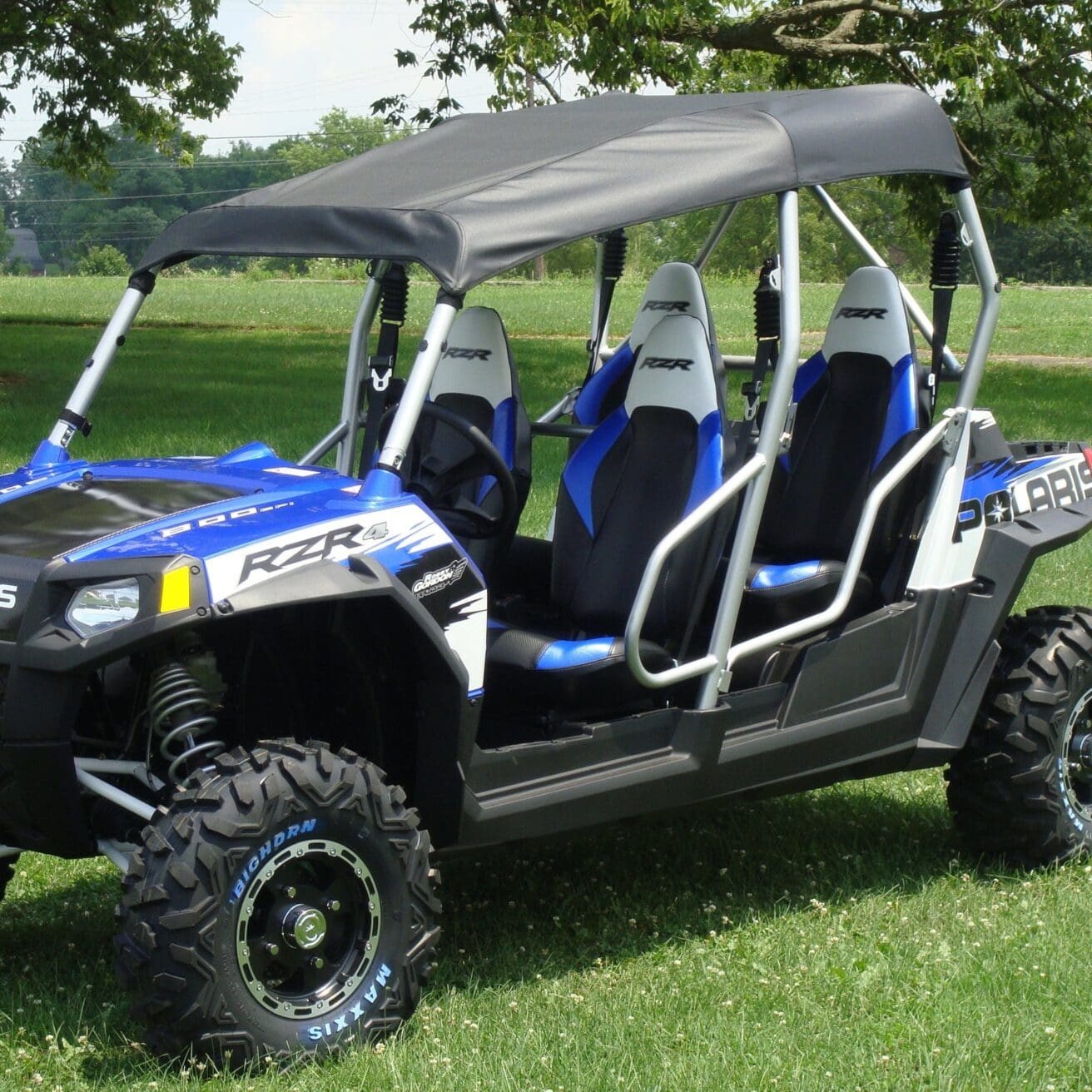 Blue Polaris RZR 4 with black top.