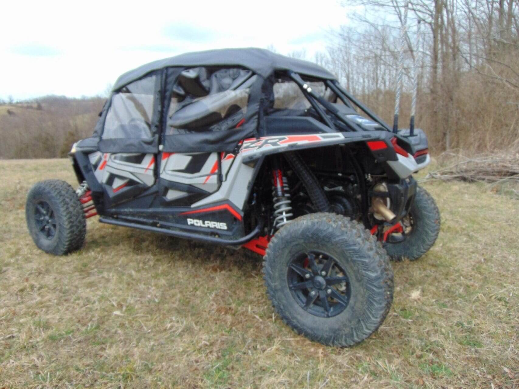 Gray Polaris RZR off-road vehicle.