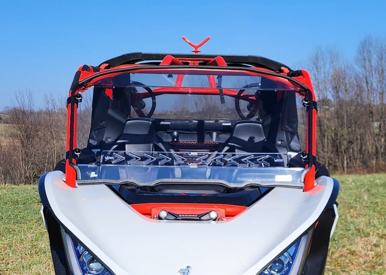 Here's an alt tag for the image: Polaris RZR windshield and roof.