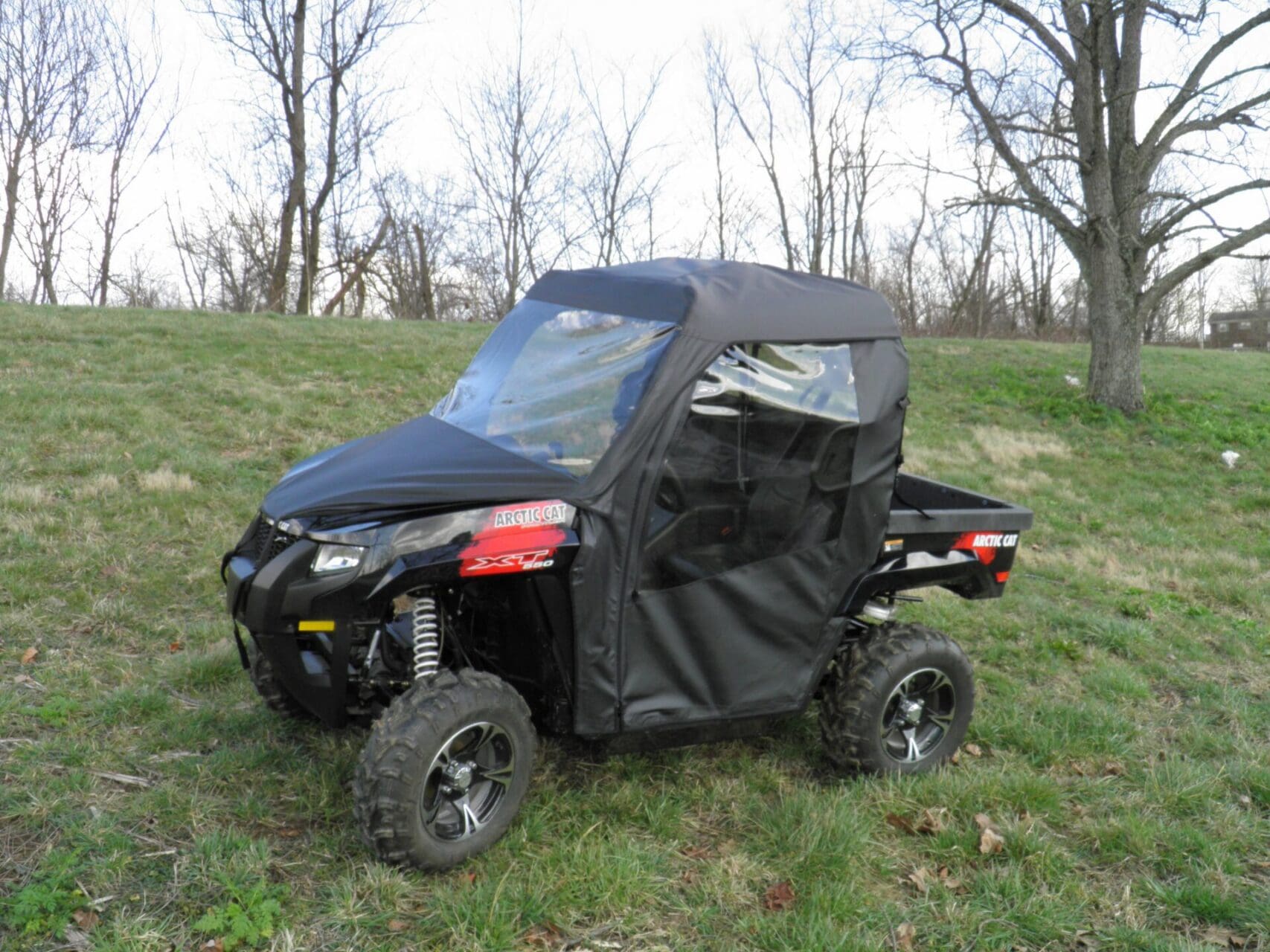 Enclosed side-by-side vehicle in black