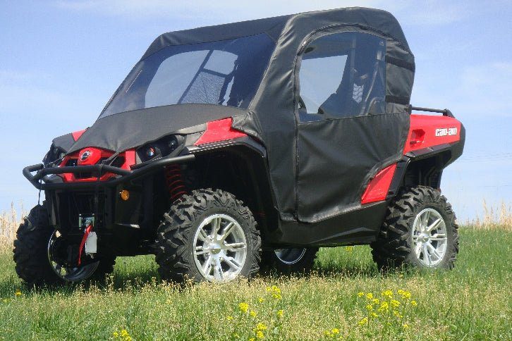 Red side-by-side UTV with soft enclosure
