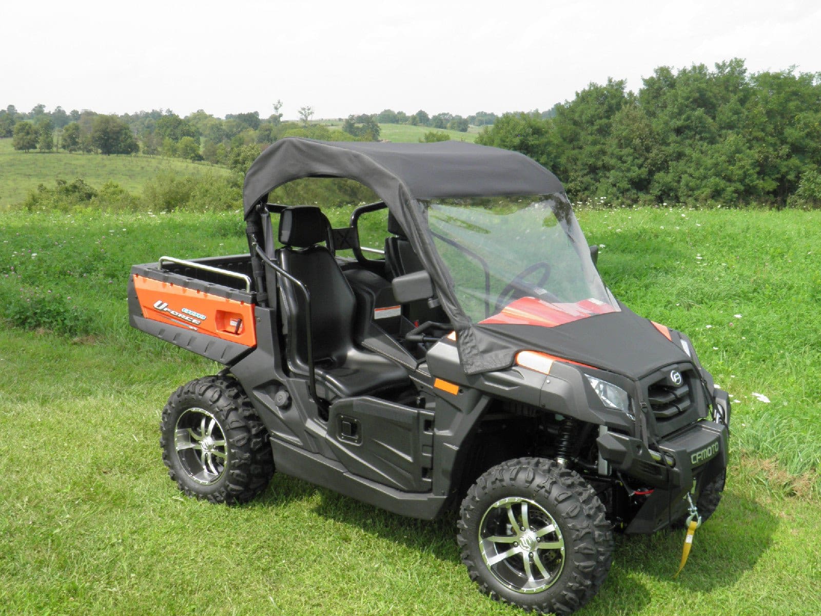 Black and orange off-road utility vehicle