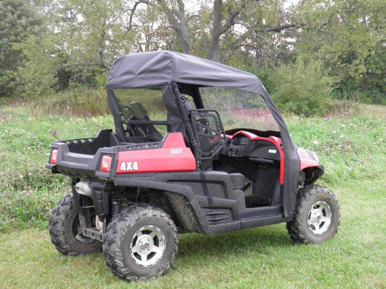 Red 4x4 off-road side-by-side UTV