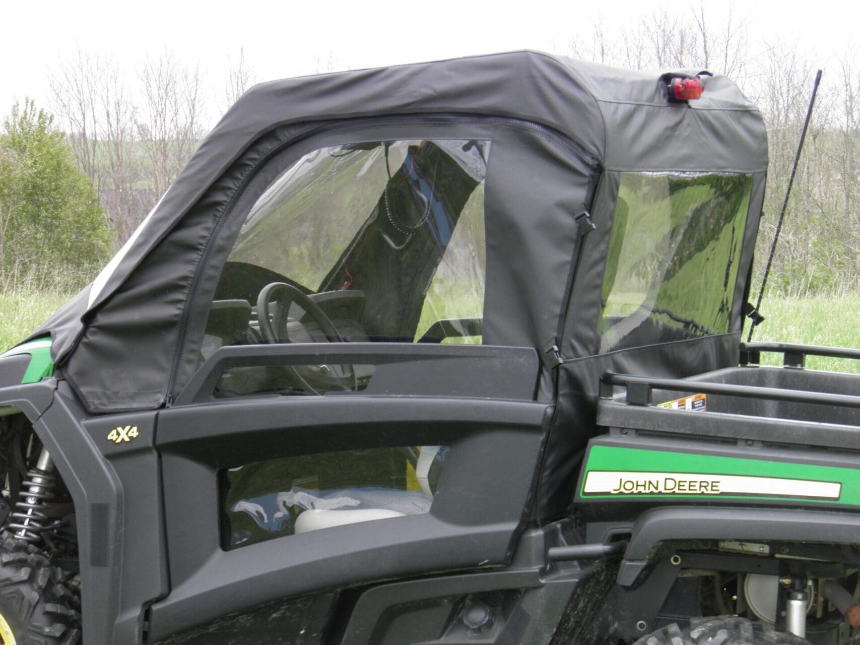 Utility vehicle with soft door enclosure