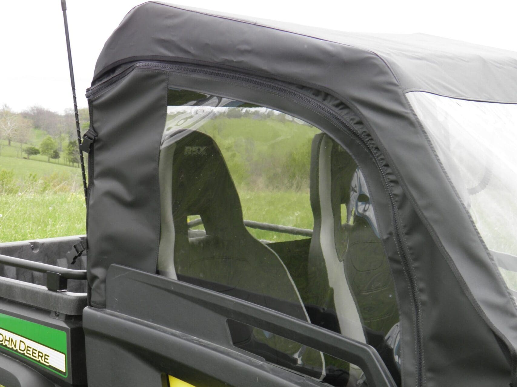 John Deere UTV with soft cab enclosure
