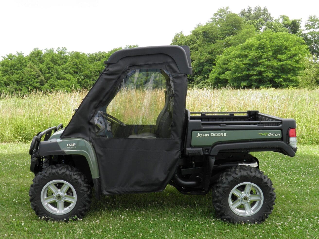 John Deere Gator UTV with cab enclosure