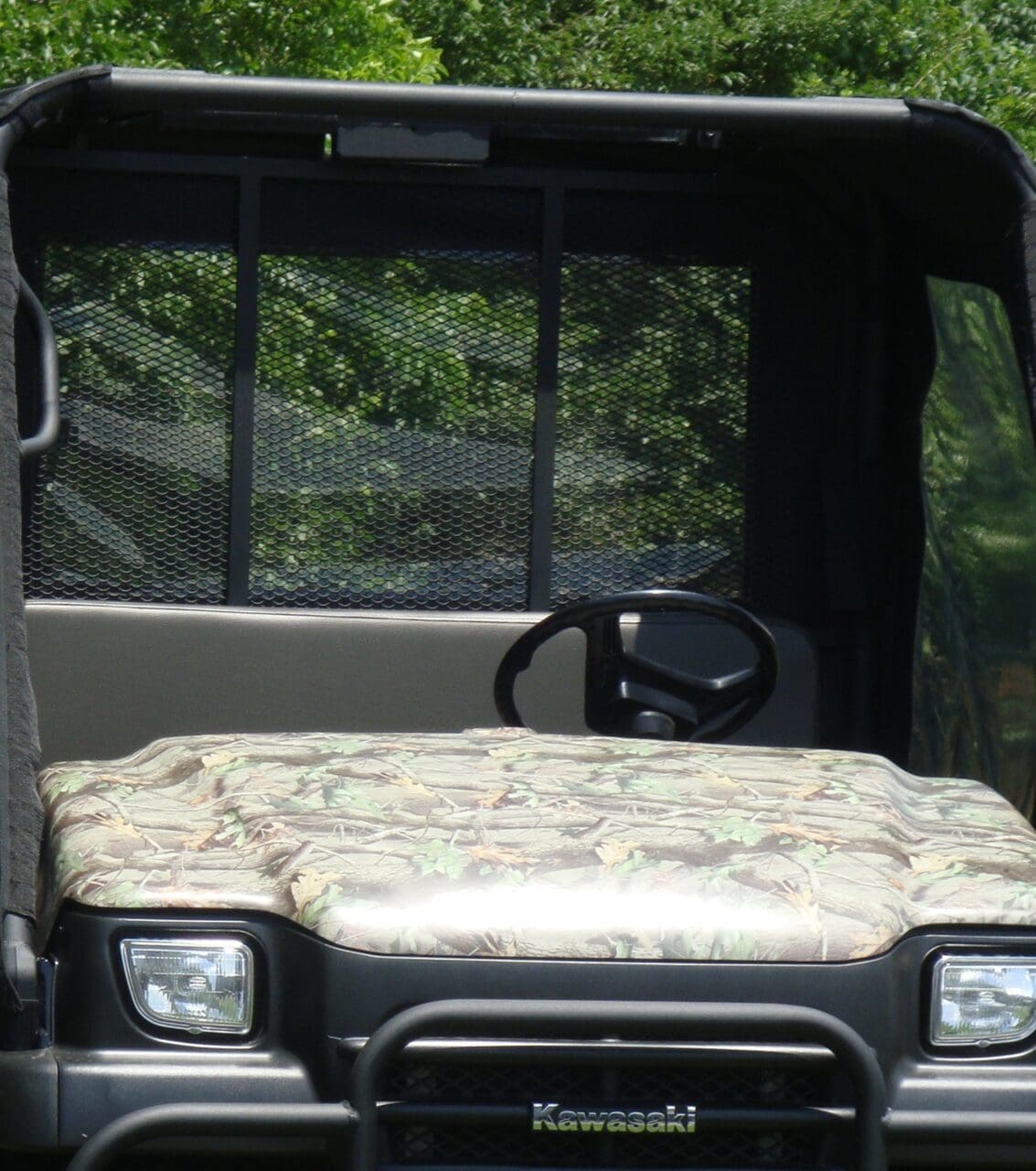 Camouflage Kawasaki utility vehicle front interior