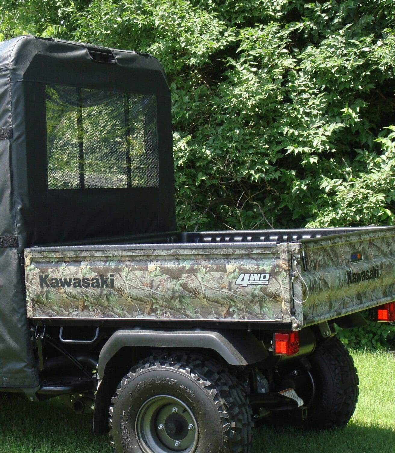 Kawasaki camo utility vehicle cargo bed