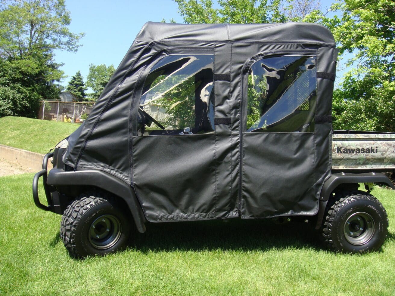 Kawasaki utility vehicle with black soft enclosure