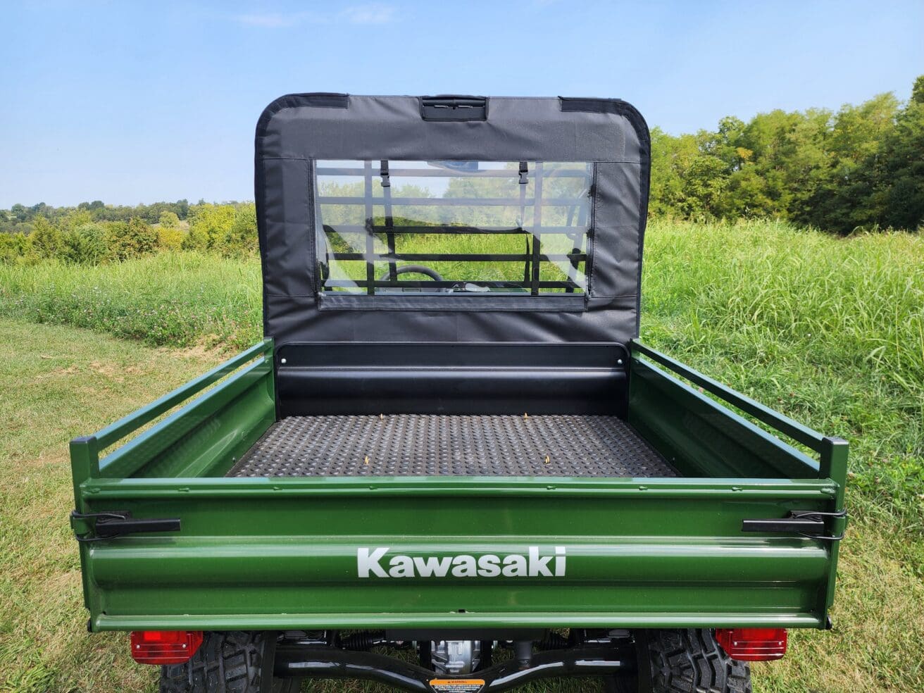 Rear view of green Kawasaki utility vehicle bed