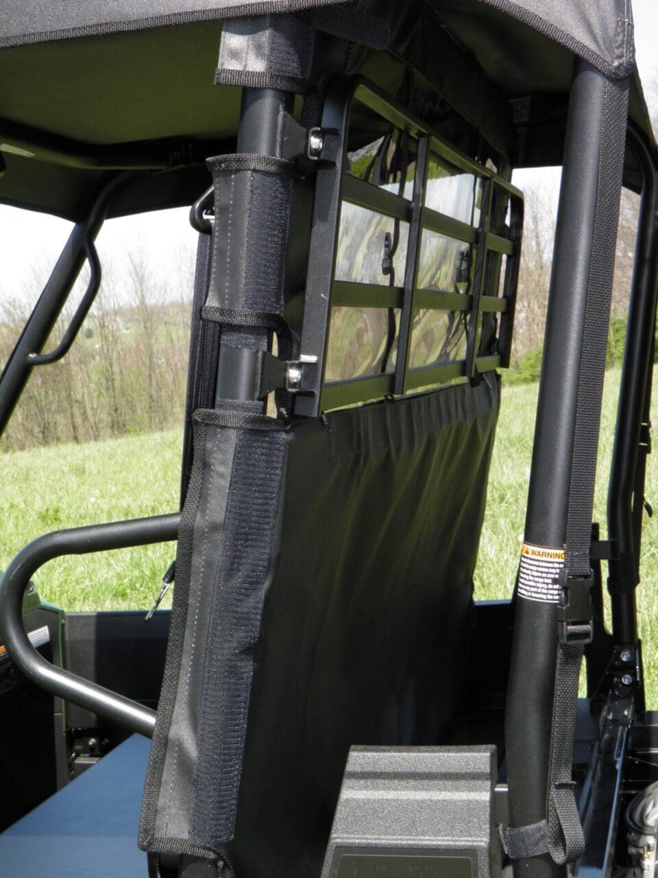 Side-by-side UTV rear seat mesh panel