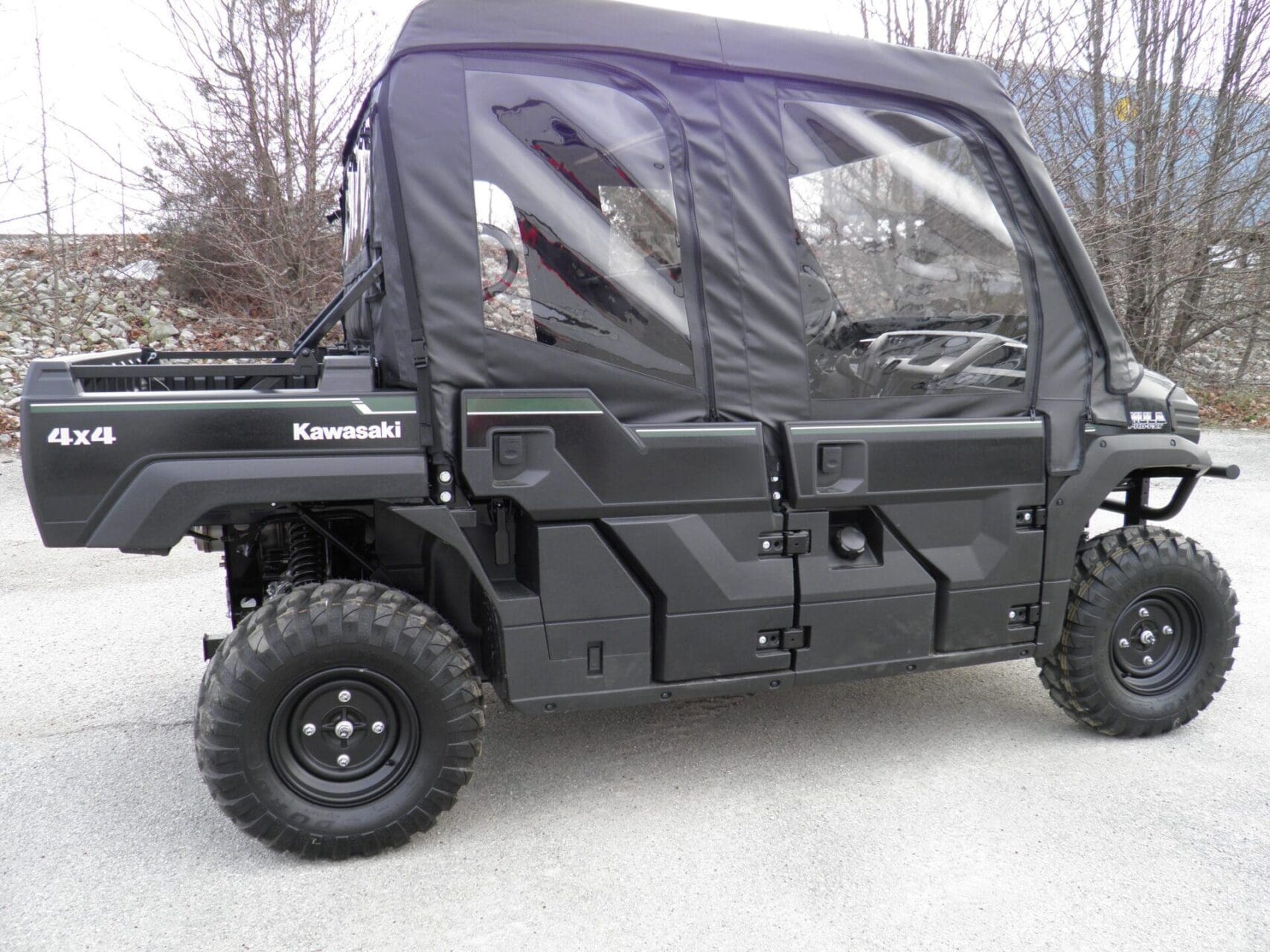 Black Kawasaki 4x4 utility side-by-side vehicle