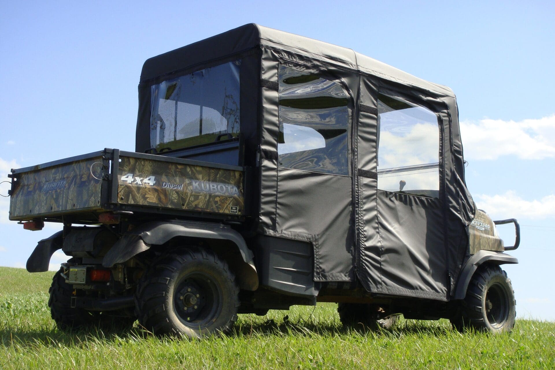 Off-road utility vehicle parked on grass