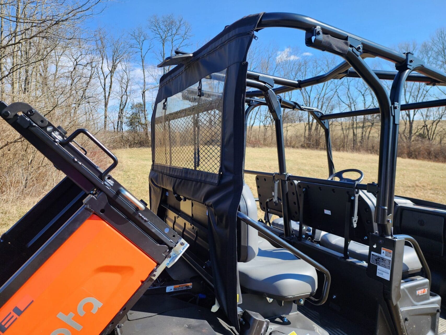 Utility vehicle with open rear cargo area.