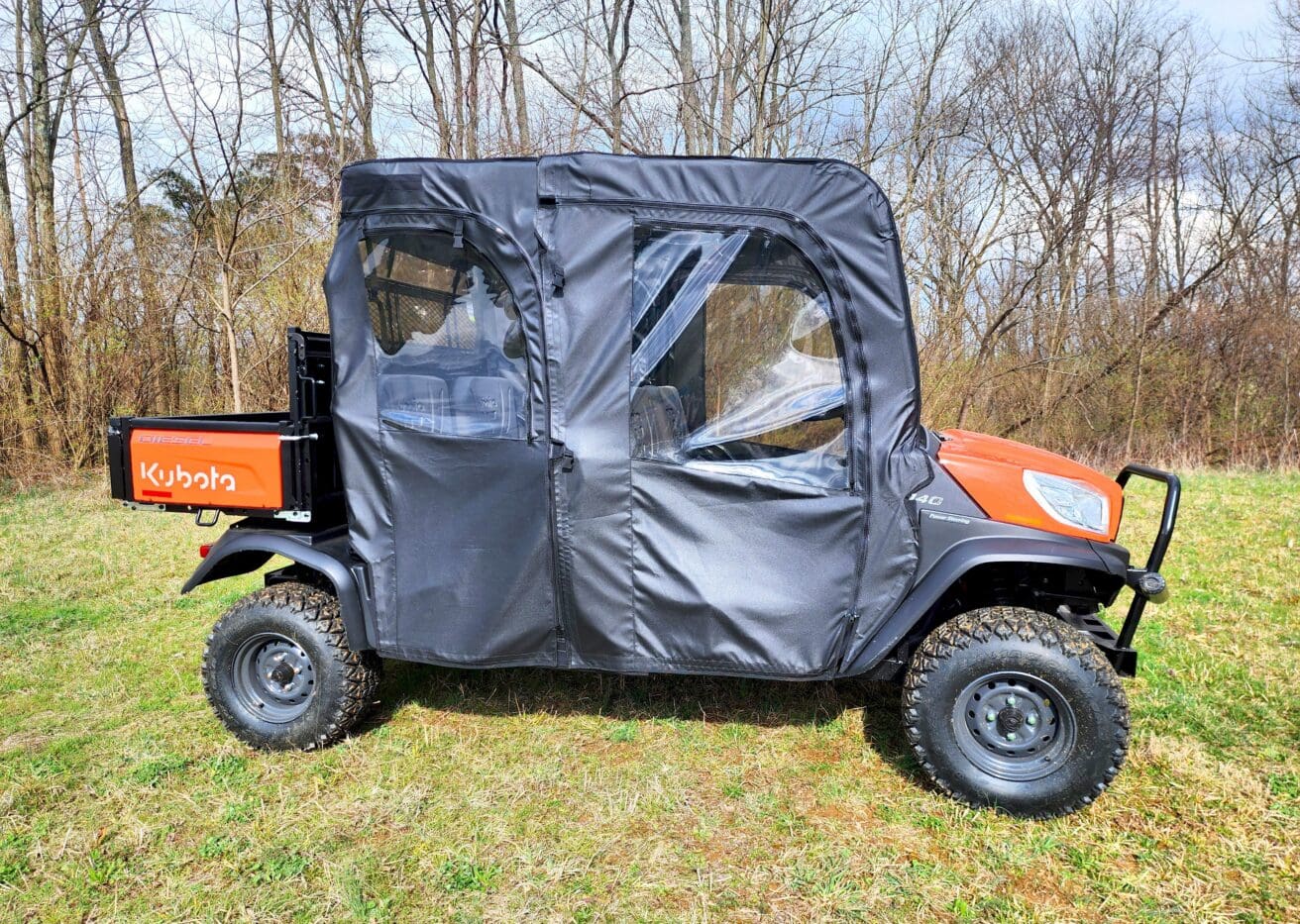 Utility vehicle with black soft enclosure.